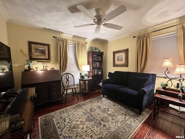 living room with ceiling fan, dark hardwood / wood-style flooring, and crown molding