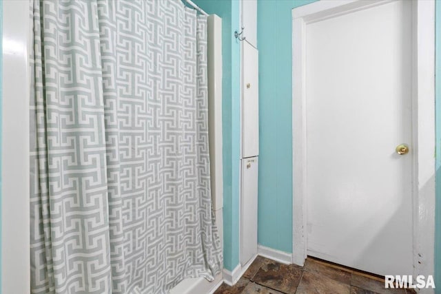 bathroom featuring walk in shower