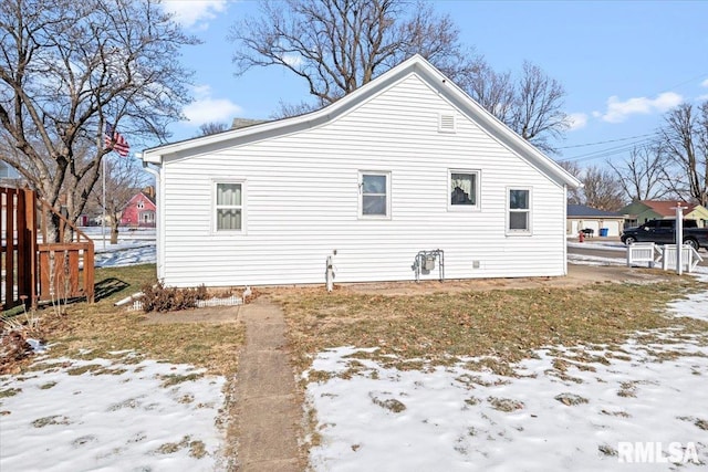 view of snow covered property