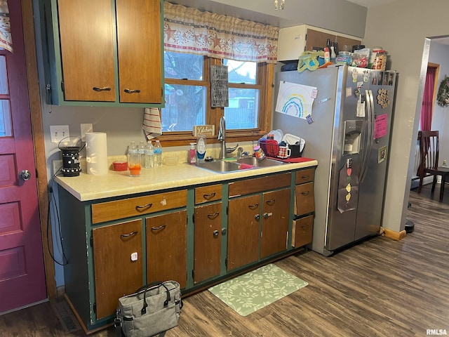 238 E Prairie St, Roodhouse, IL 62082 - kitchen with stainless steel refrigerator with ice dispenser, sink, and dark wood-type flooring