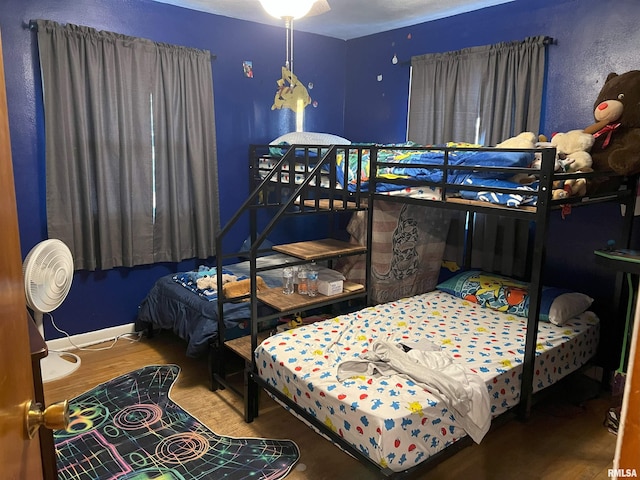 238 E Prairie St, Roodhouse, IL 62082 - bedroom with wood-type flooring