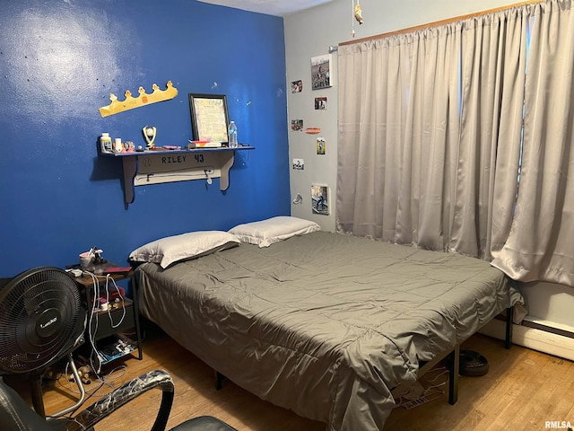 238 E Prairie St, Roodhouse, IL 62082 - bedroom with wood-type flooring