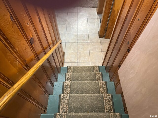 238 E Prairie St, Roodhouse, IL 62082 - stairs with wooden walls and tile patterned floors