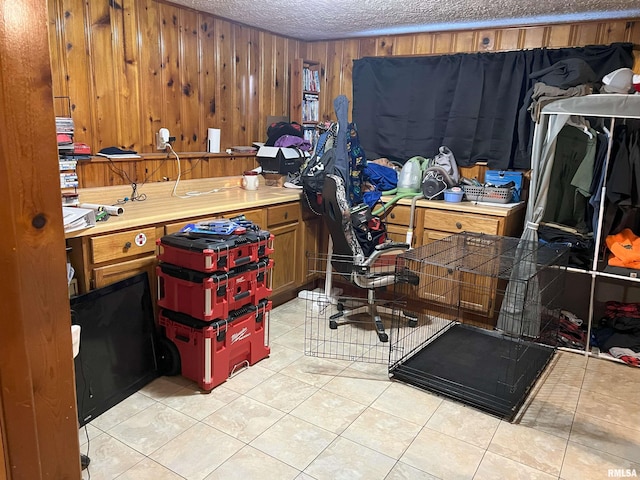 238 E Prairie St, Roodhouse, IL 62082 - office space featuring light tile patterned floors, wooden walls, and a textured ceiling