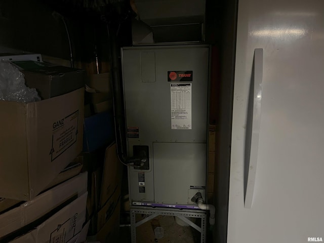 238 E Prairie St, Roodhouse, IL 62082 - utility room featuring heating unit