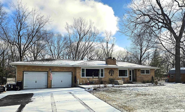 ranch-style home with a garage