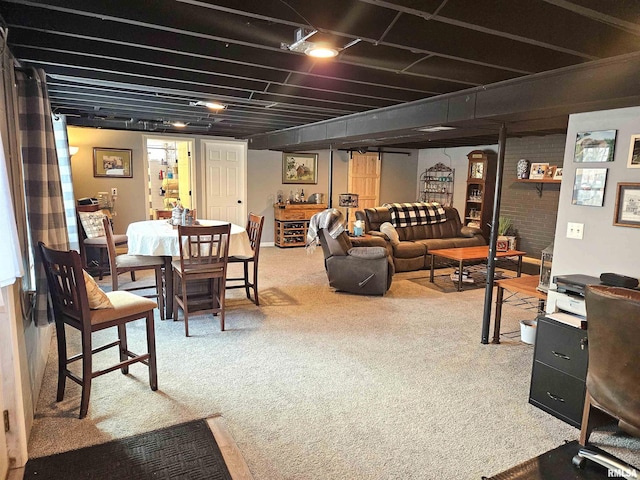 interior space with carpet floors and brick wall