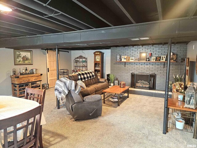 living room featuring carpet and a fireplace