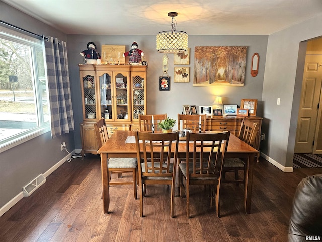 dining room featuring dark hardwood / wood-style floors