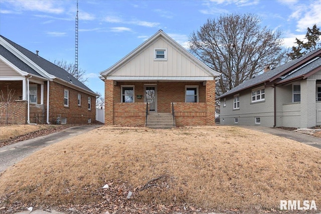 bungalow-style home with covered porch