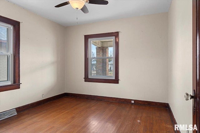 unfurnished room featuring wood-type flooring and ceiling fan