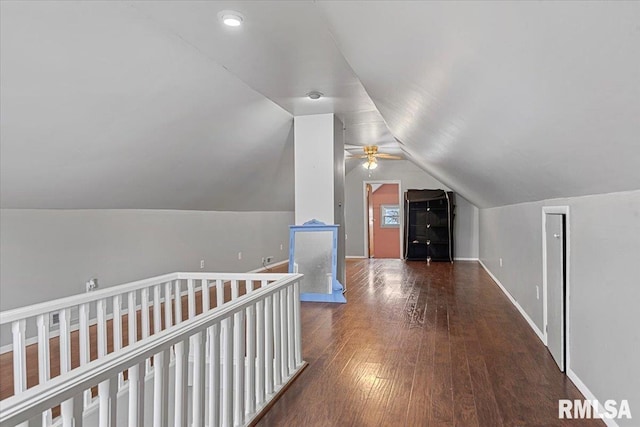 bonus room featuring lofted ceiling and dark wood-type flooring