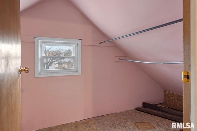 spacious closet featuring vaulted ceiling