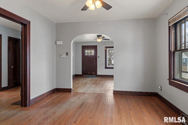 entrance foyer with wood-type flooring and ceiling fan