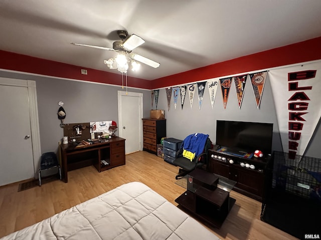 bedroom featuring ceiling fan and light wood-type flooring