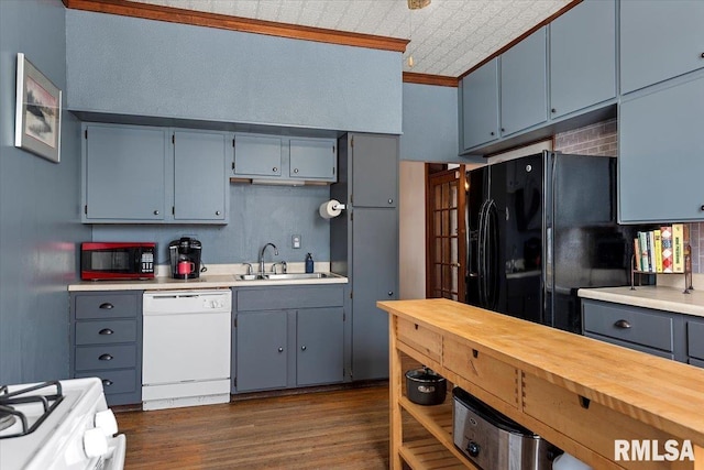 kitchen featuring sink, crown molding, white appliances, dark hardwood / wood-style flooring, and decorative backsplash