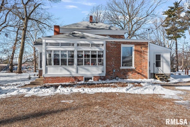 view of snow covered property