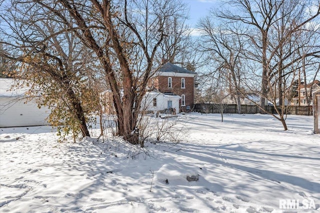 view of snowy yard