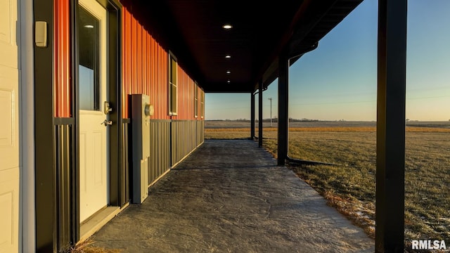 view of stable with a rural view