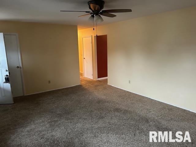 carpeted empty room with ceiling fan