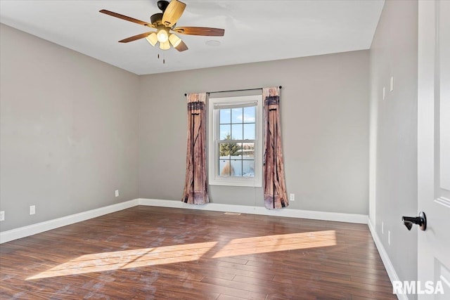 unfurnished room featuring ceiling fan and dark hardwood / wood-style flooring