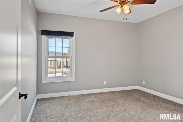 carpeted empty room with ceiling fan