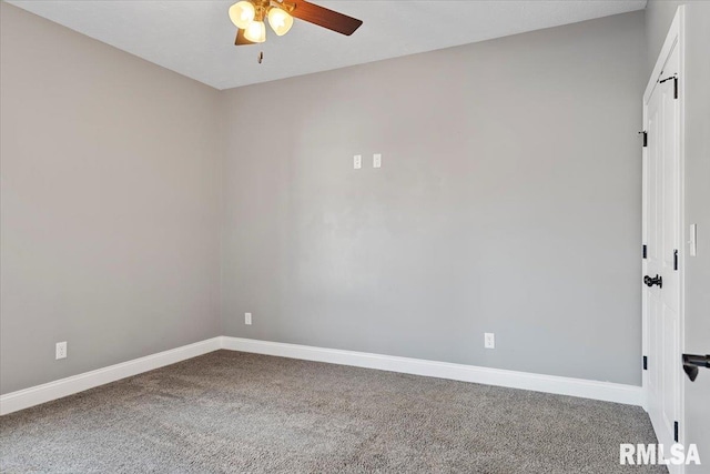 empty room featuring ceiling fan and carpet flooring