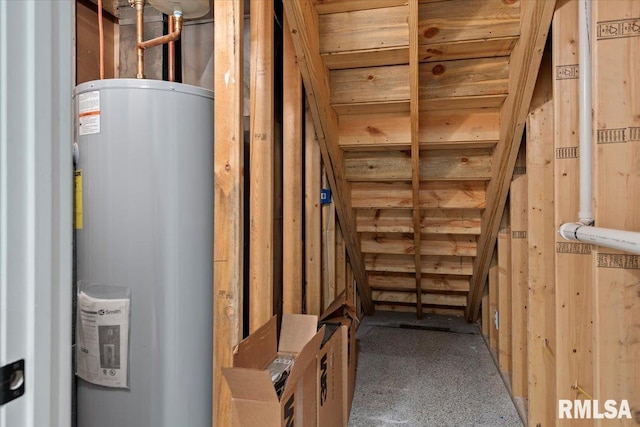 utility room featuring water heater