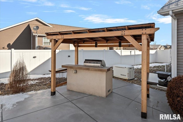 view of patio / terrace featuring area for grilling and a pergola