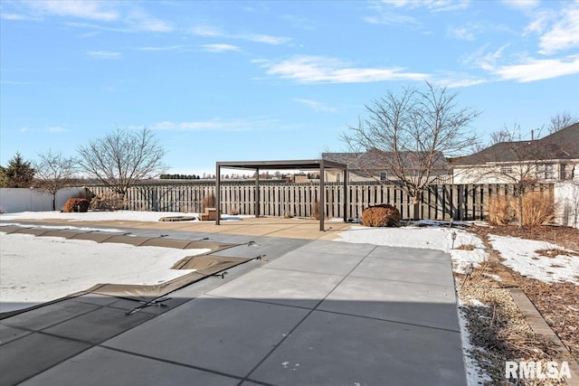 view of snow covered patio