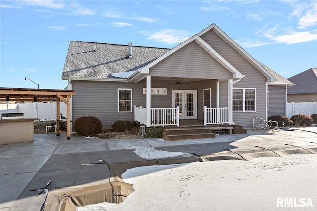 view of front of property featuring ceiling fan and a patio