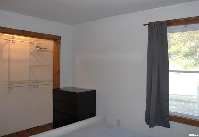 unfurnished bedroom with a closet