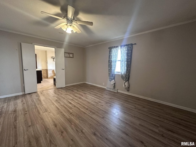 unfurnished room with hardwood / wood-style flooring, ornamental molding, and ceiling fan