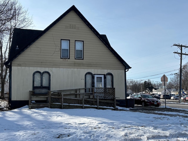 view of snow covered property