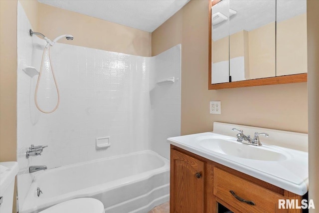 full bathroom with vanity, a textured ceiling, shower / bathtub combination, and toilet