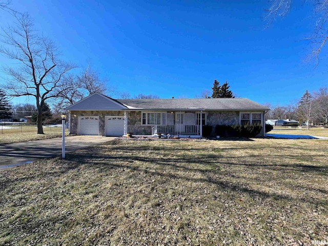 ranch-style home with a garage, a front lawn, and a porch