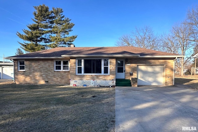 ranch-style house with a garage and a front yard