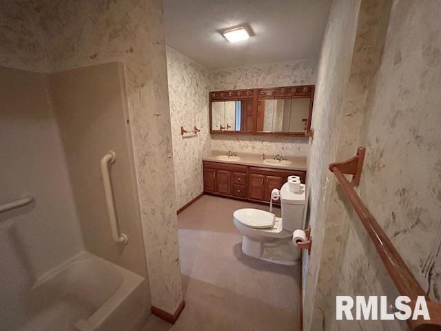 full bathroom with vanity, shower / tub combination, and toilet