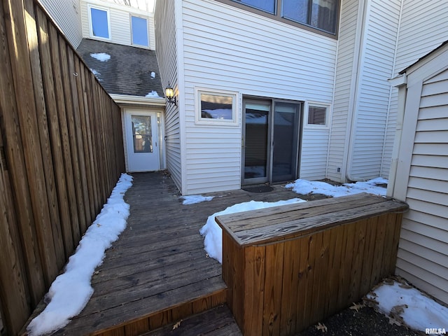 view of snow covered deck