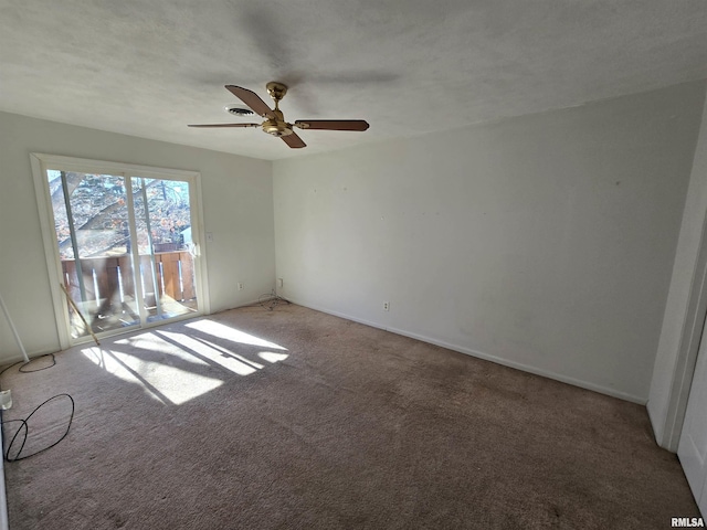 carpeted empty room with ceiling fan