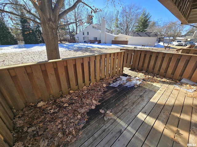 view of snow covered deck