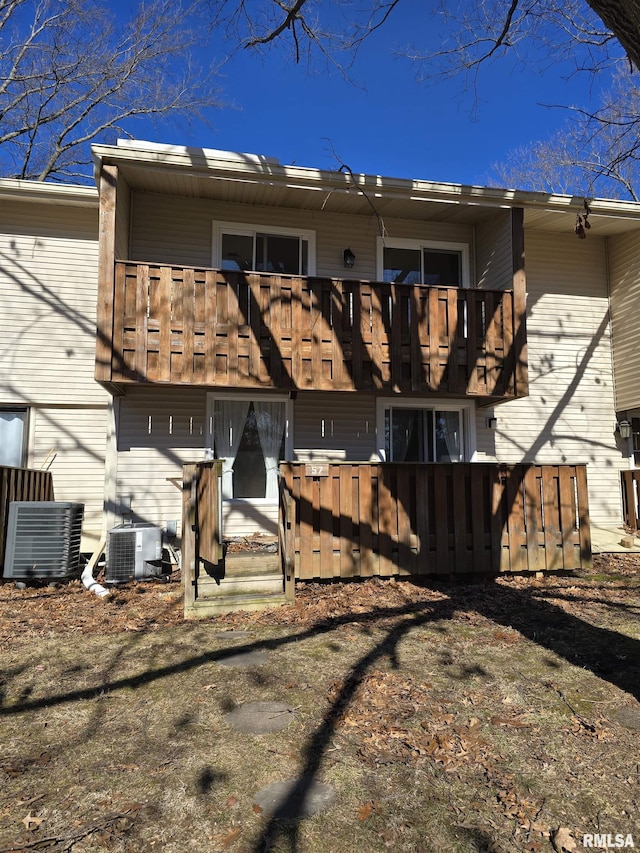 back of property with central air condition unit