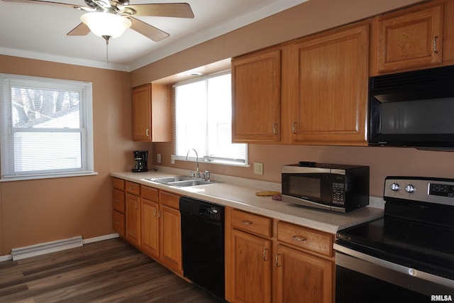 kitchen featuring sink, crown molding, dark hardwood / wood-style flooring, ceiling fan, and black appliances