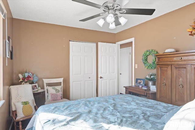 bedroom with a closet and ceiling fan