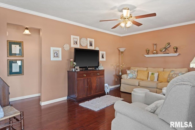 living room with crown molding, ceiling fan, and dark hardwood / wood-style flooring