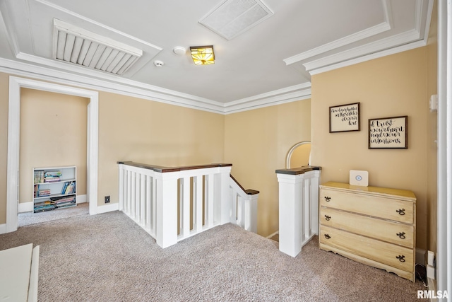 hallway with crown molding and carpet flooring