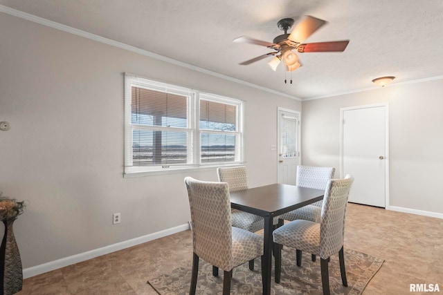 dining area with crown molding, a textured ceiling, and ceiling fan