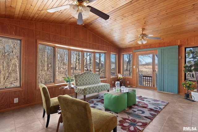 living room with vaulted ceiling, light tile patterned floors, wooden ceiling, and wooden walls