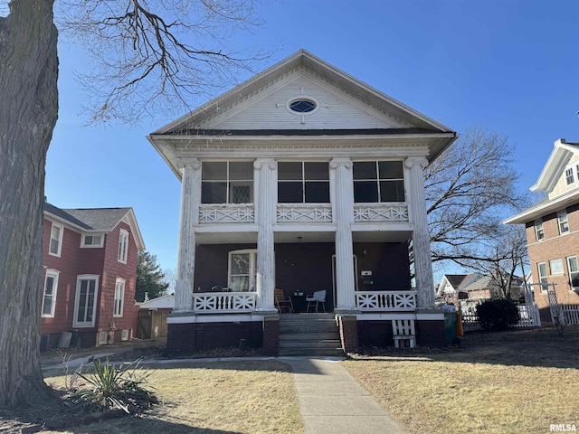 neoclassical home with a porch