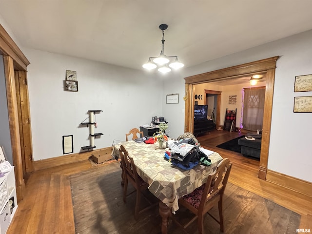 dining room with hardwood / wood-style flooring